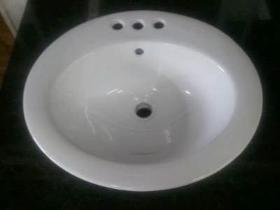Oval Vanity Drop in White
Narrow 4" faucet Spread. $50 
